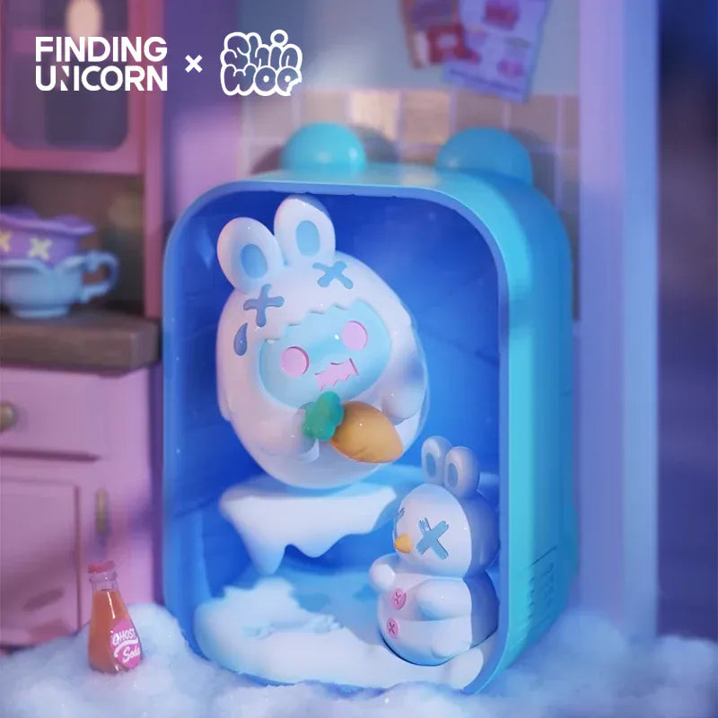 A figurine of a ghost in a rabbit skin holding a carrot inside a freezer beside a miniature snowman.