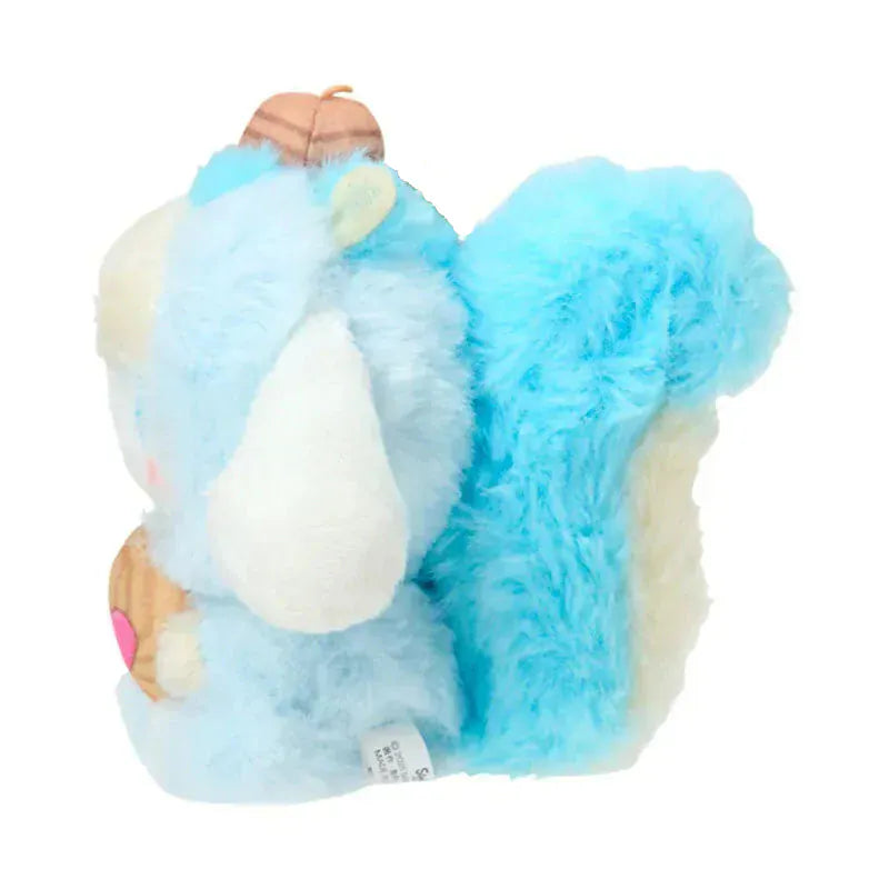 Side-view of Cinnamoroll plush keychain showcasing the squirrel costume's fluffy tail