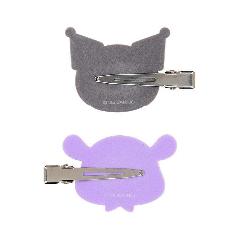 Back of hairclips that are a metal beak style. Each clip's hardware faces the opposite direction. Sanrio copyright mark shown on back of the clip.