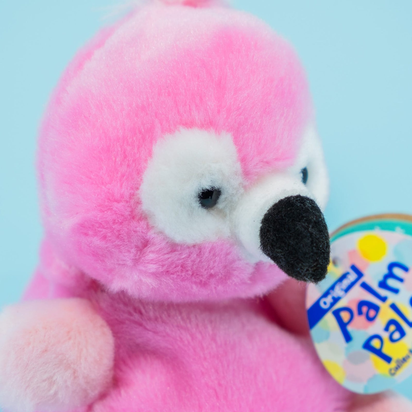 A cute plush of a flamingo.