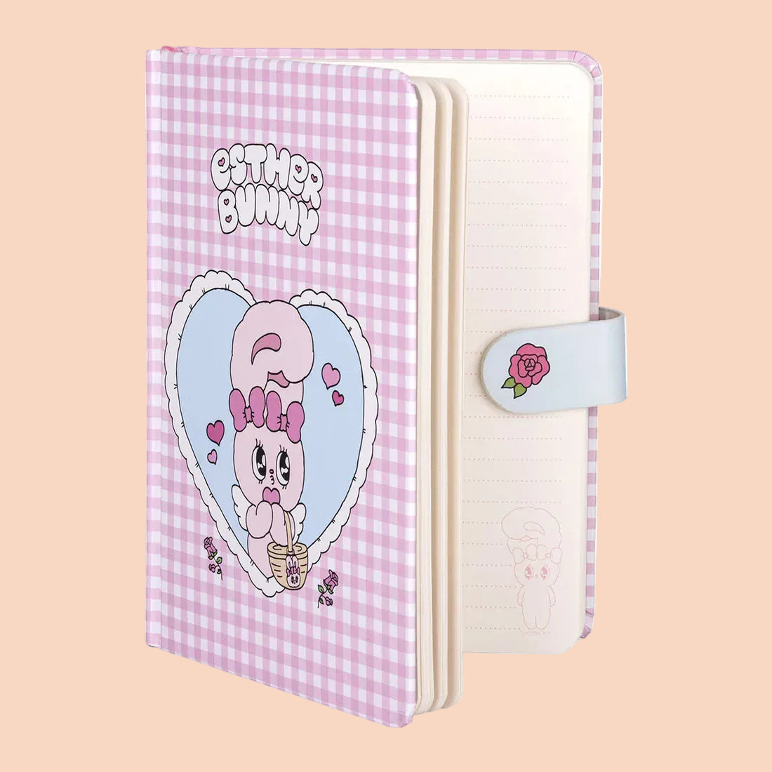 Photo of open pink gingham notebook. Says Esther Bunny with the character inside a heart. Notebook has clasp