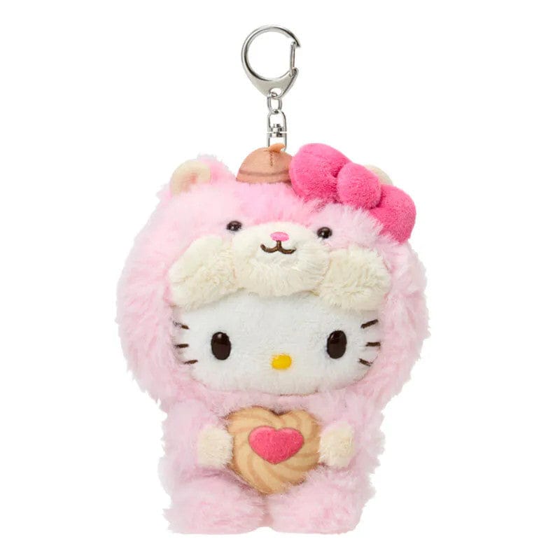 Plush keychain of Hello Kitty cat character in a pink squirrel outfit holding a heart-shaped nut treat. Has silver lobster clasp.