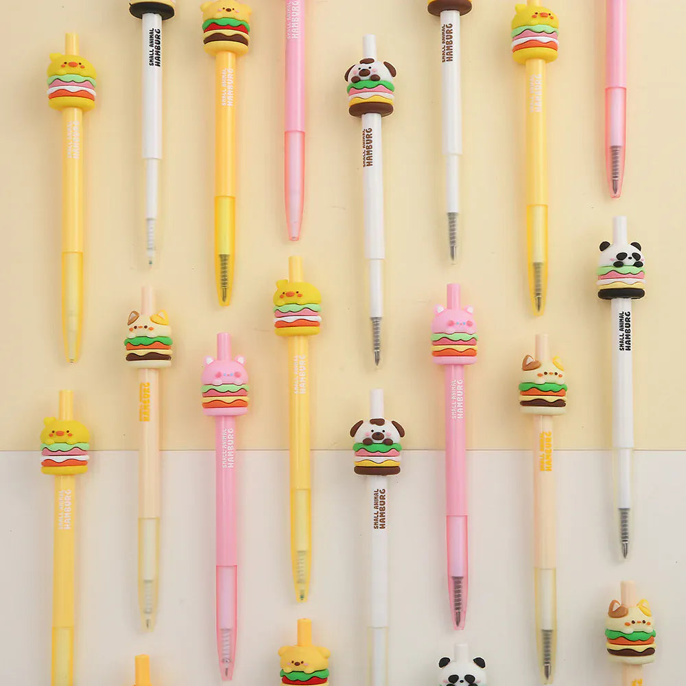 A group of colorful pens with little animal burger toppers. The toppers are pandas, dogs, and cats.