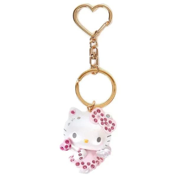 Gold hardware keychain with heart-shaped clasp featuring molded Hello Kitty figure as an angel encrusted with rhinestones