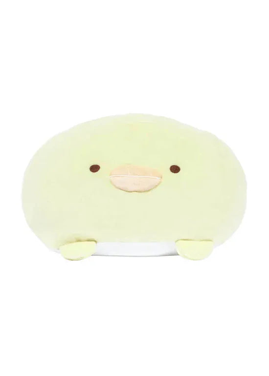 A round yellow chicken plush with a silly face.