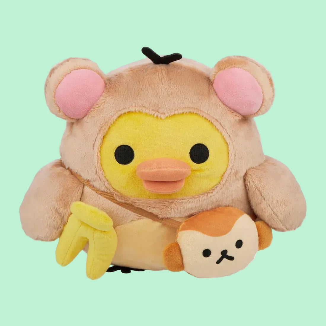 A cute plush of a rotund duckling wearing a monkey outfit.
