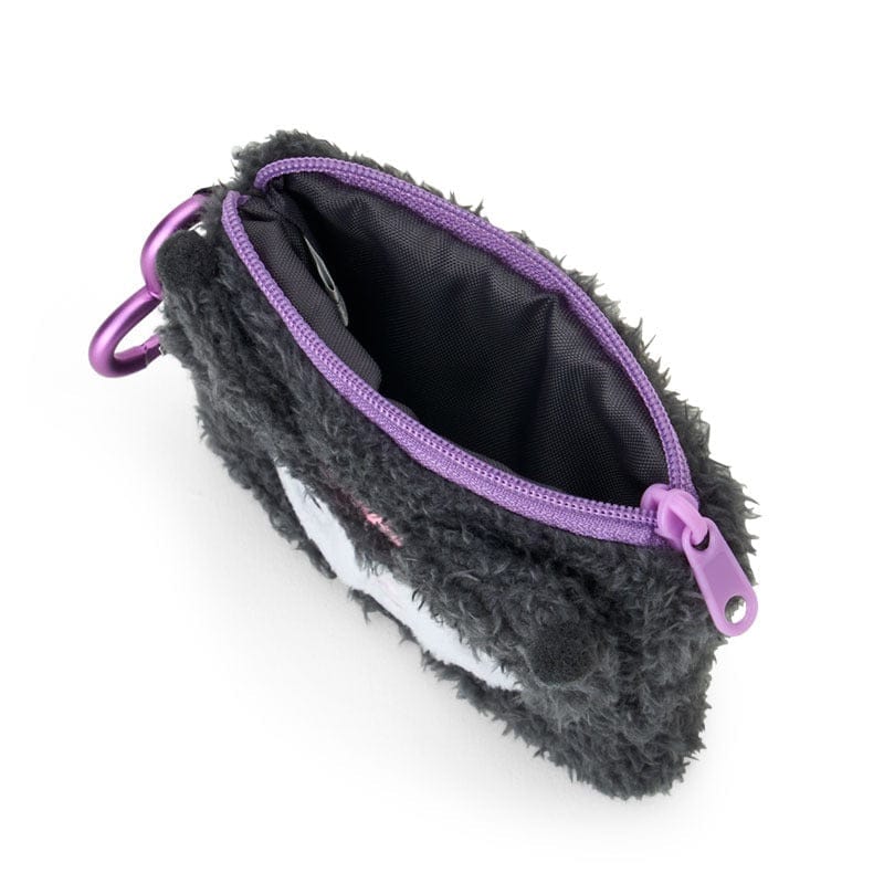 Close-up of pouch showing zipper pull undone revealing inner purple lining color