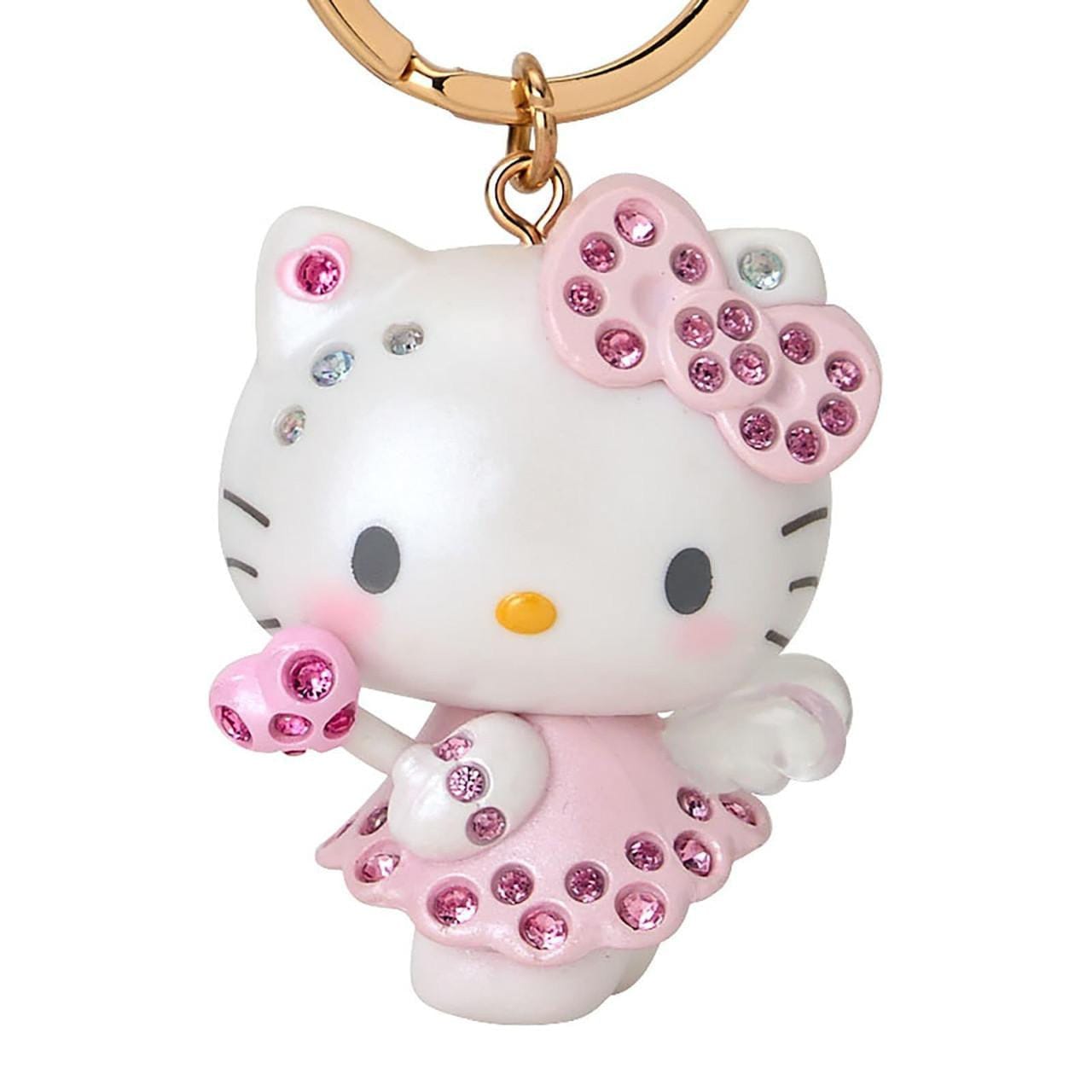 Closeup of molded Hello Kitty figure as an angel encrusted with rhinestones