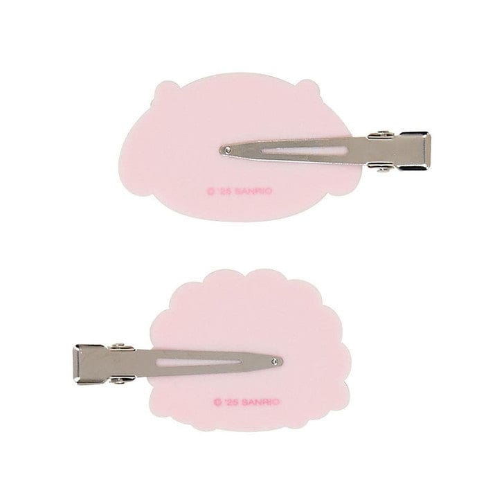 Back of hairclips that are a metal beak style. Each clip's hardware faces the opposite direction. Sanrio copyright mark shown on back of the clip.