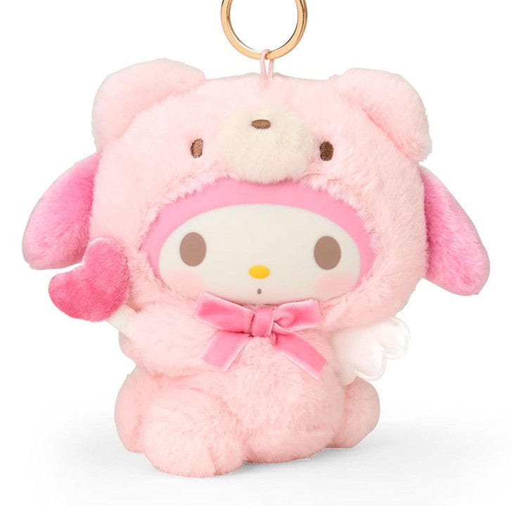 Closeup of plush My melody in a pink bear costume with wings and a heart wand