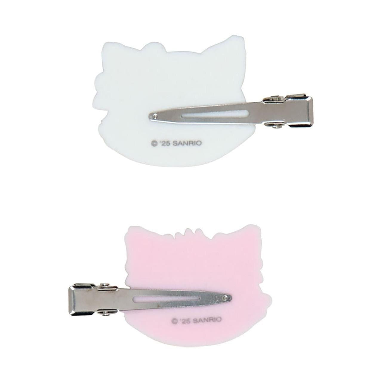 Back of hairclips that are a metal beak style. Each clip's hardware faces the opposite direction. Sanrio copyright mark shown on back of the clip.