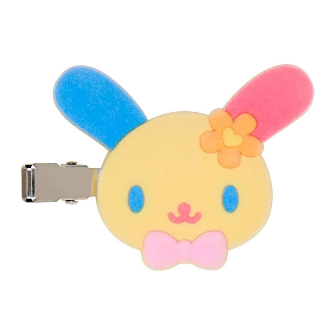Sanrio bangs clip showing front view character face of Usahana, a bunny with a red ear and a blue ear with a pink bowtie