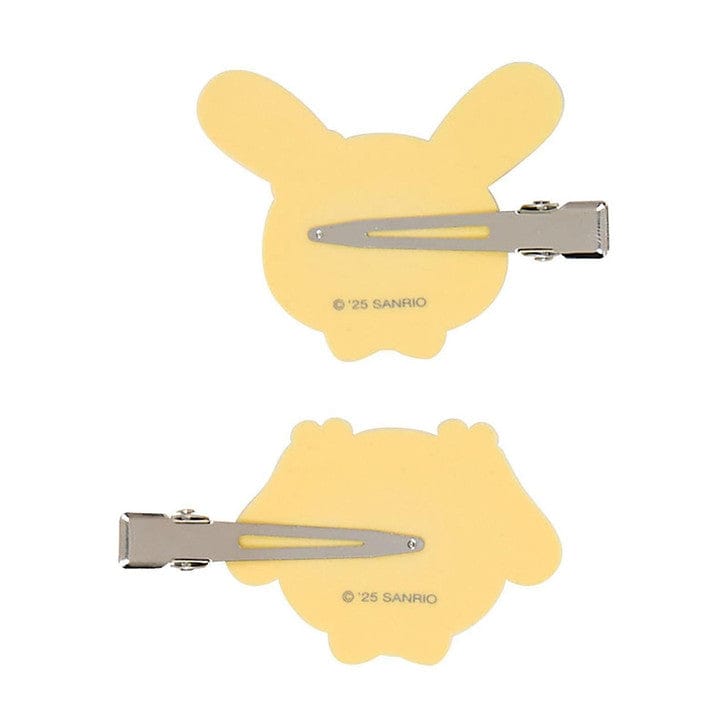 Back of hairclips that are a metal beak style. Each clip's hardware faces the opposite direction. Sanrio copyright mark shown on back of the clip.