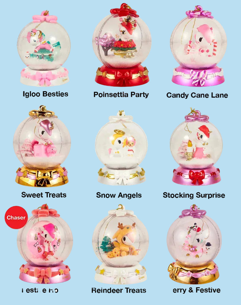 A collection of various Tokidoki ornaments of unicorns in snow globes.