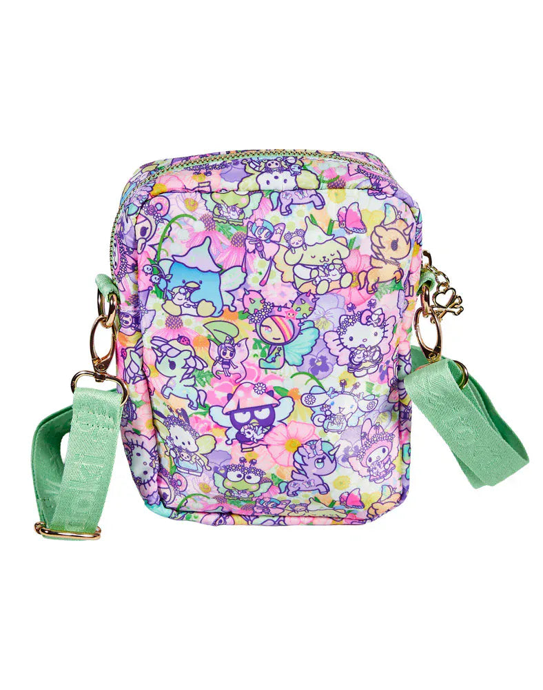 Pastel bag with Tokidoki characters and light green strap.