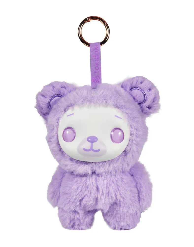 A cute, fluffy, purple bear plush. It has large sparkling eyes