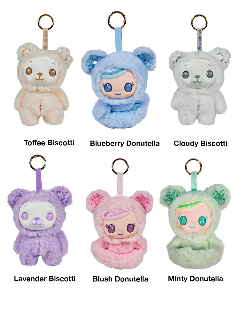 A graphic showing six different plushies with their names underneath. From left to right their names are Toffee Biscuit, Blueberry Donutella, Cloudy Biscotti, Lavender Biscotti, Bush Donutella, and Minty Donutella.