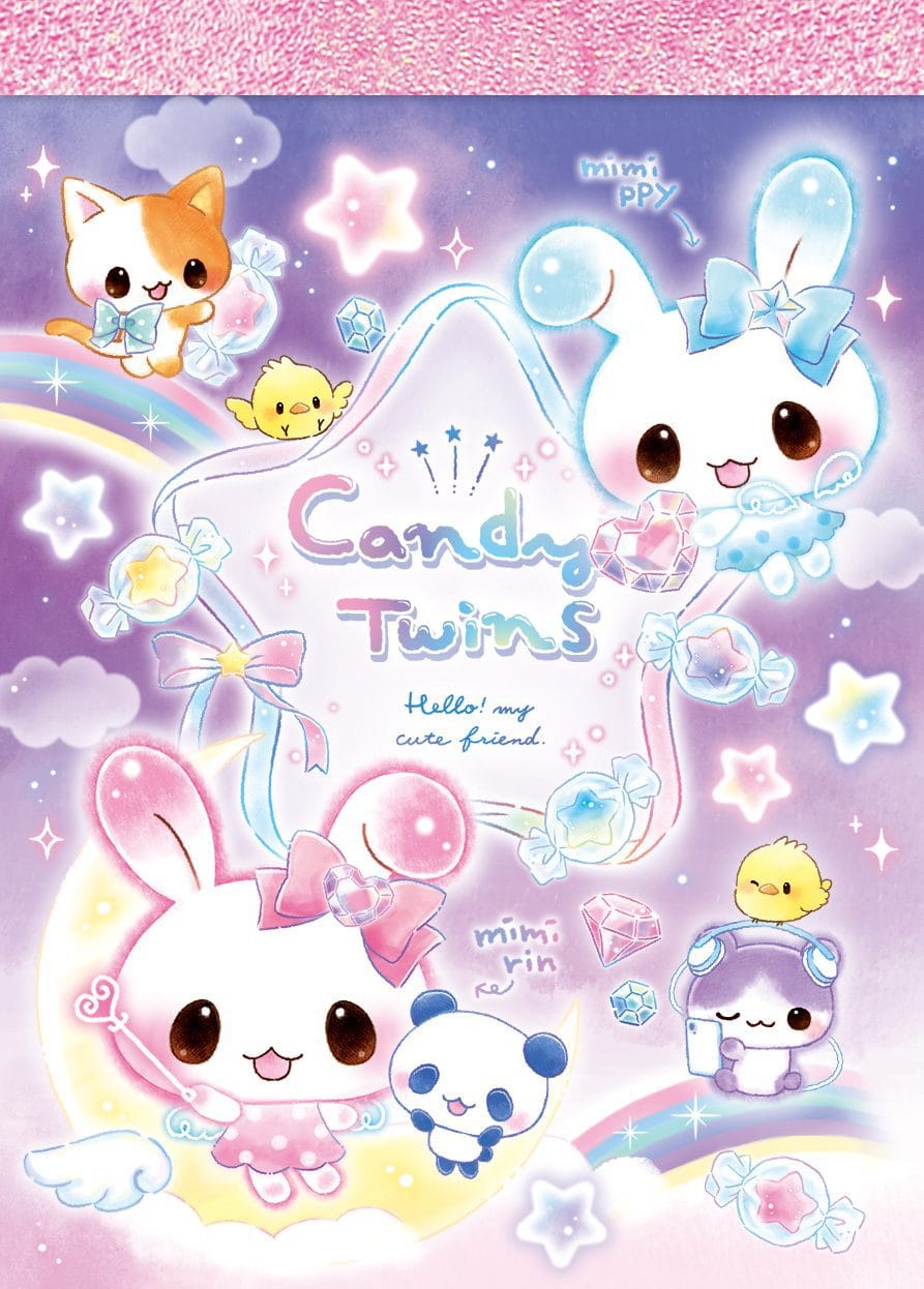 A memo pad with cute illustrations of bunny characters dressed as fairies frolicking on rainbows. There is text in the center reading "Candy Twins".
