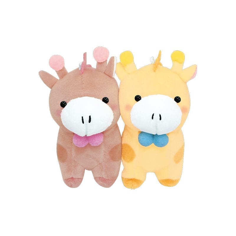 Two giraffe plushies. One is brown with a pink bow, while the other is yellow with a blue bow.