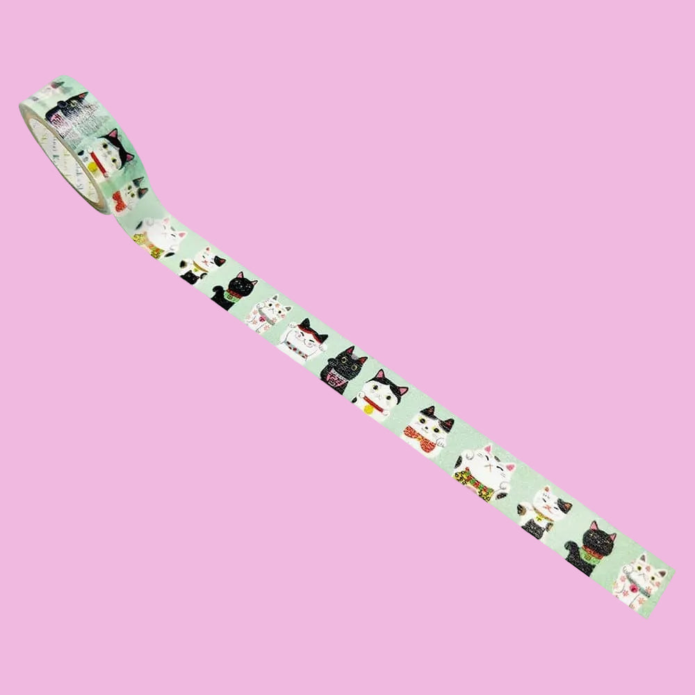 Washi tape showing many differently patterned lucky cats.