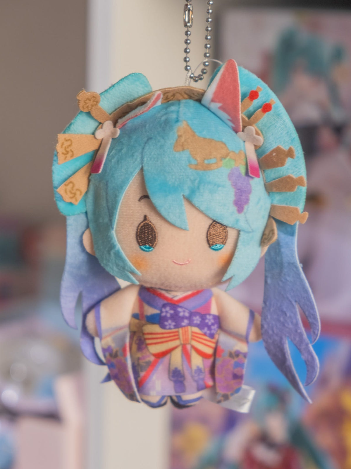 A plush keychain of Hatsune Miku.