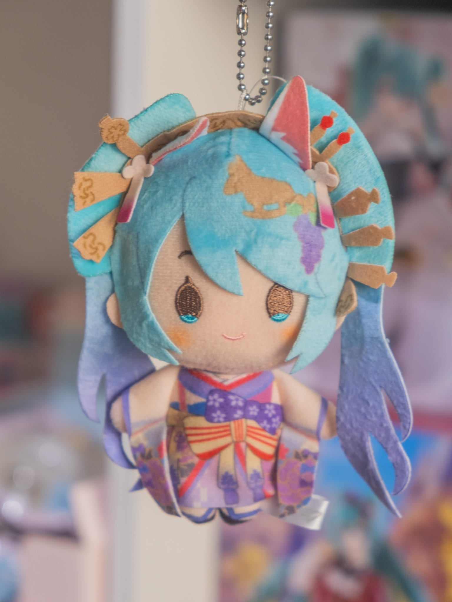 A plush keychain of Hatsune Miku.