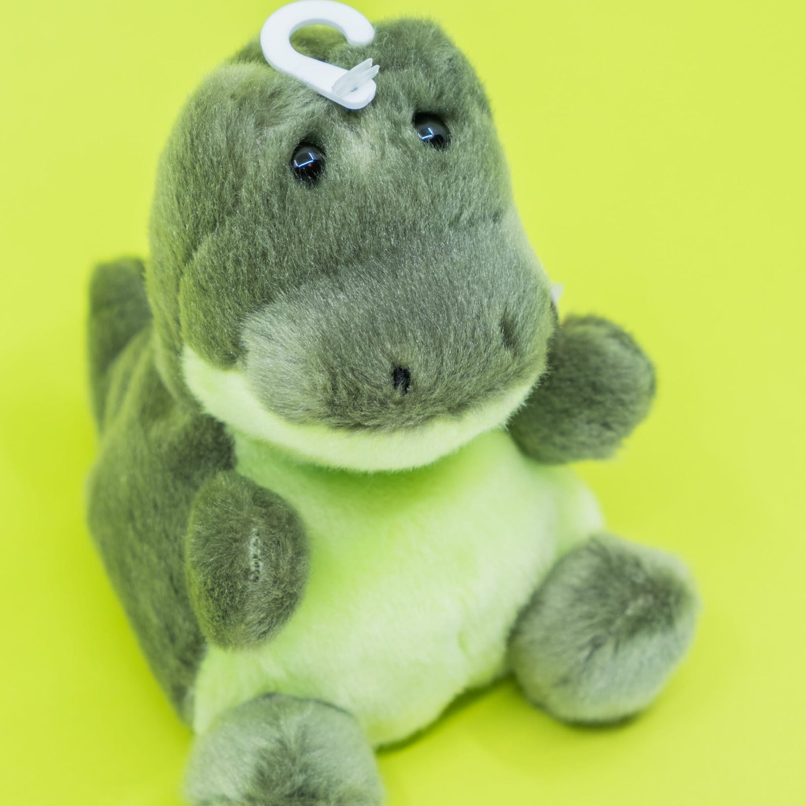 A cute plush of an alligator.
