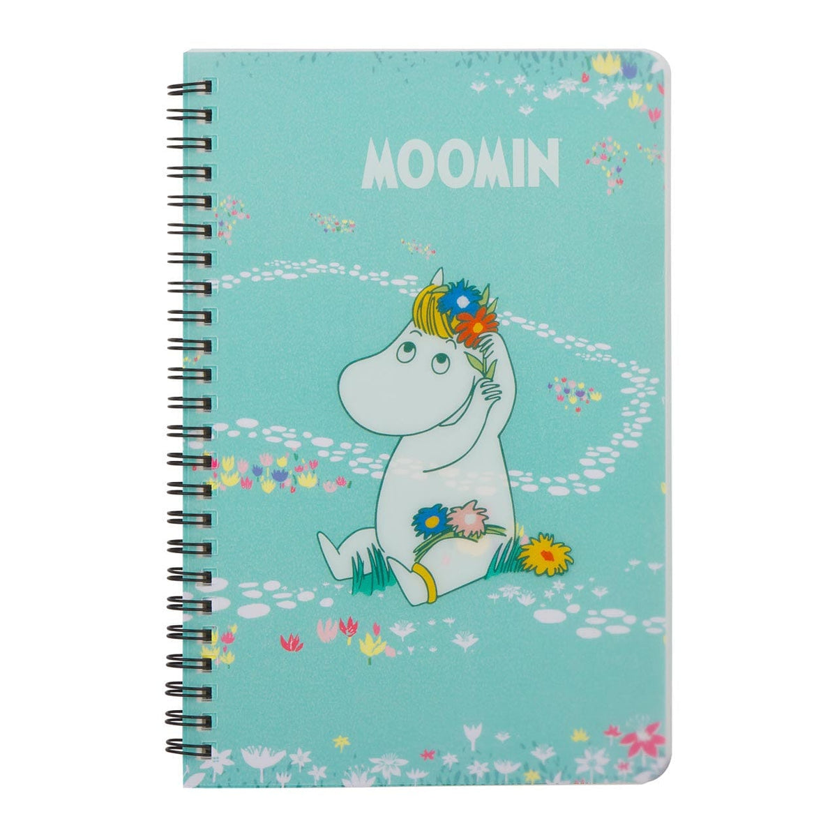 A blue notebook with an illustration of a white hippo sitting in a flower field on the front cover. The hippo is putting some of the flowers in its hair.