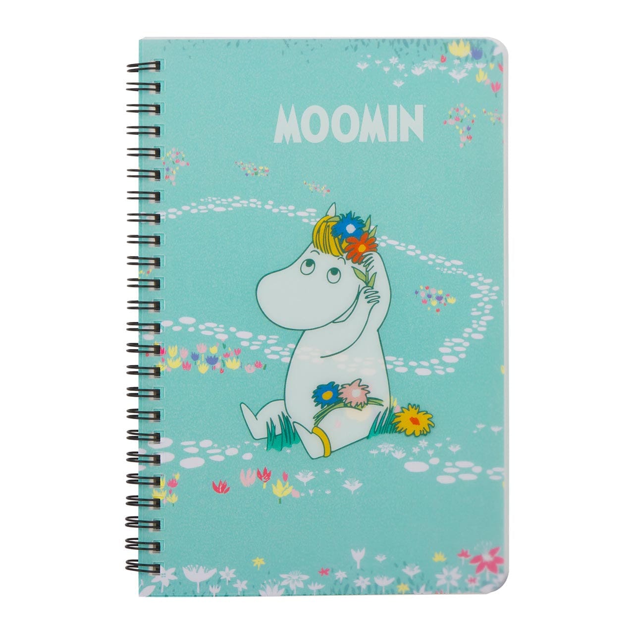 A blue notebook with an illustration of a white hippo sitting in a flower field on the front cover. The hippo is putting some of the flowers in its hair.