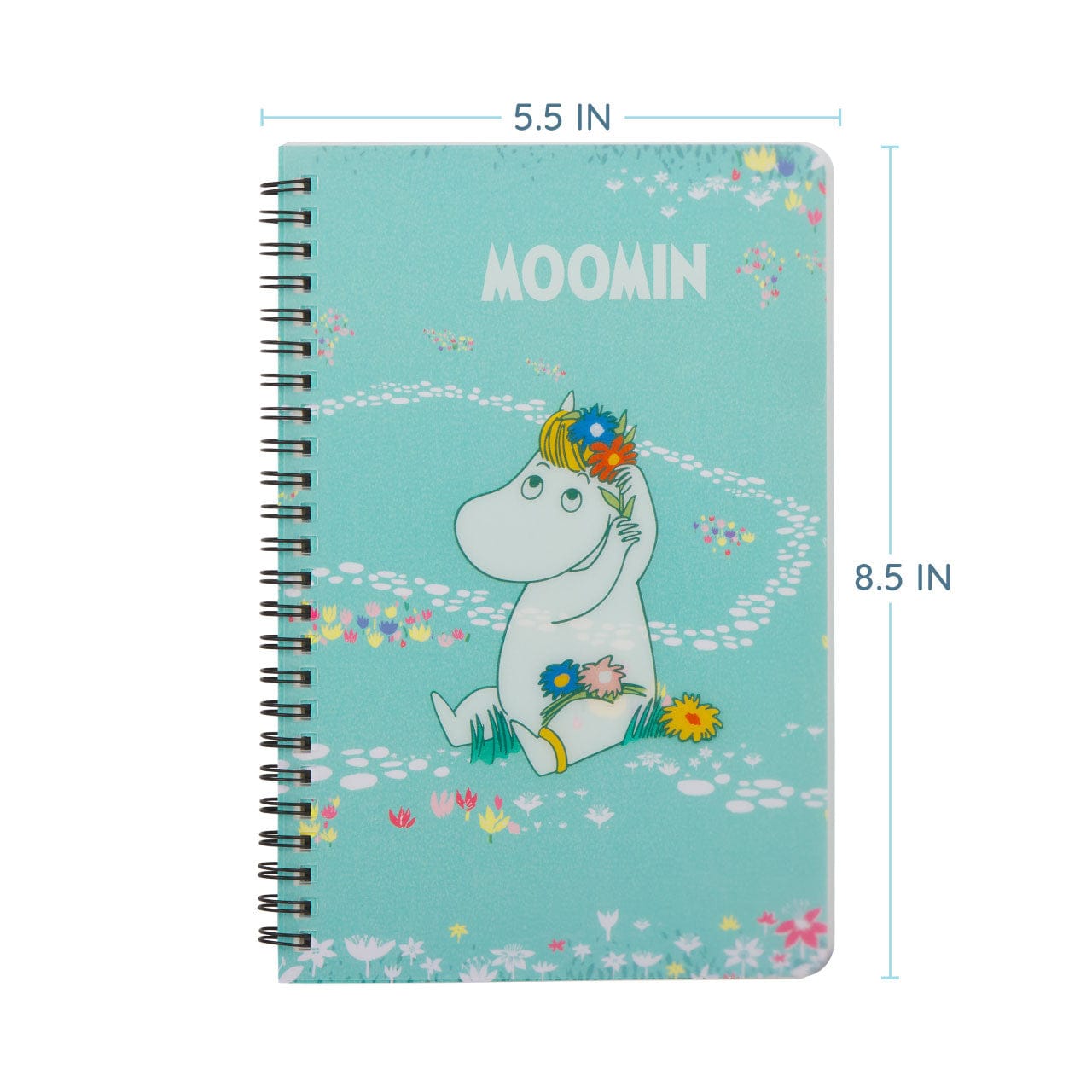 A blue notebook with an illustration of a white hippo sitting in a flower field on the front cover. The hippo is putting some of the flowers in its hair.