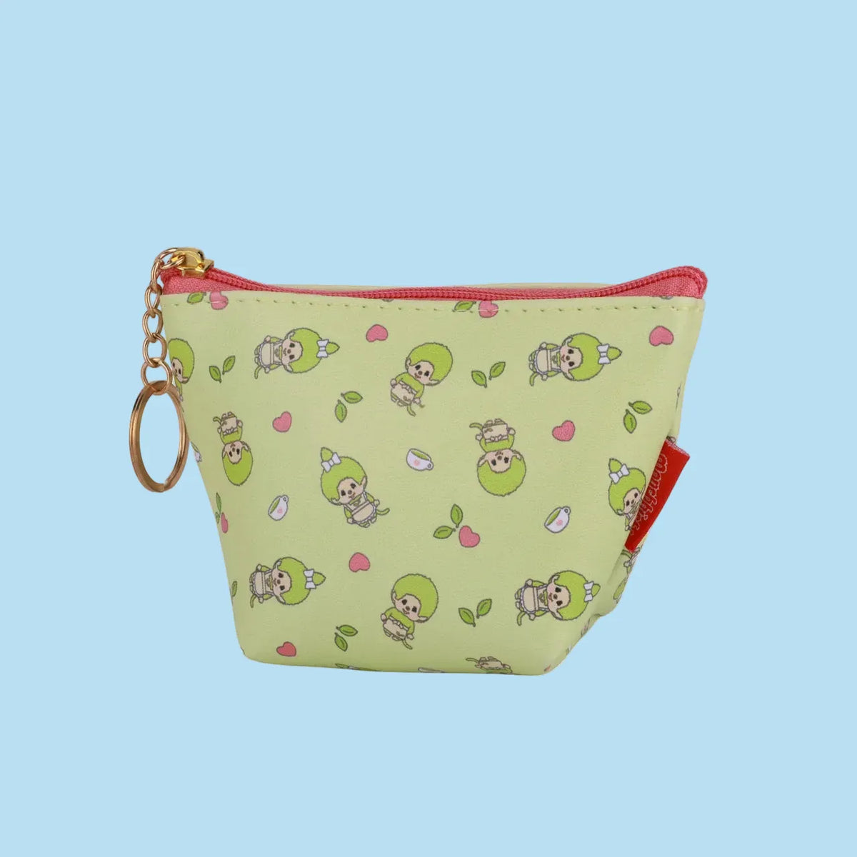 Back view of the keychain bag, with the monchhichi motify all over, hearts, cups of tea, and tea leaves.