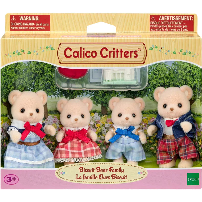 A box containing a little family of anthropomorphic bears. The bears are all dressed up in plaid and have little bows.