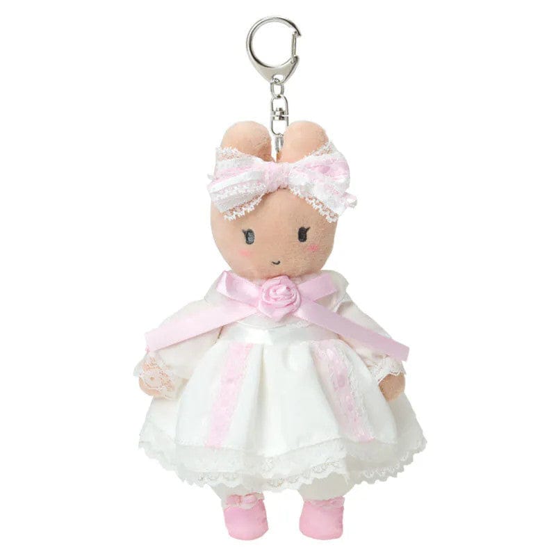 Keychain of Marroncream wearing a white dress and bow with charming lace details, delicate frills, and sweet pink touches. Hardware is silver.