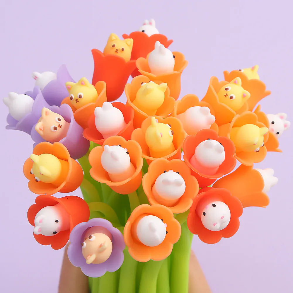A collection of pens designed to look like flowers with little cats sitting in the petals. The pens are grouped like a bouquet of flowers.