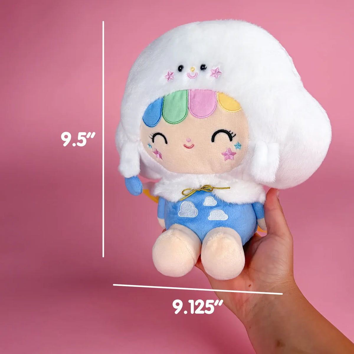 A cute plush of a girl wearing a smiling cloud hat. There are measurements showing she is 9.5 inches tall and 9.125 inches wide.