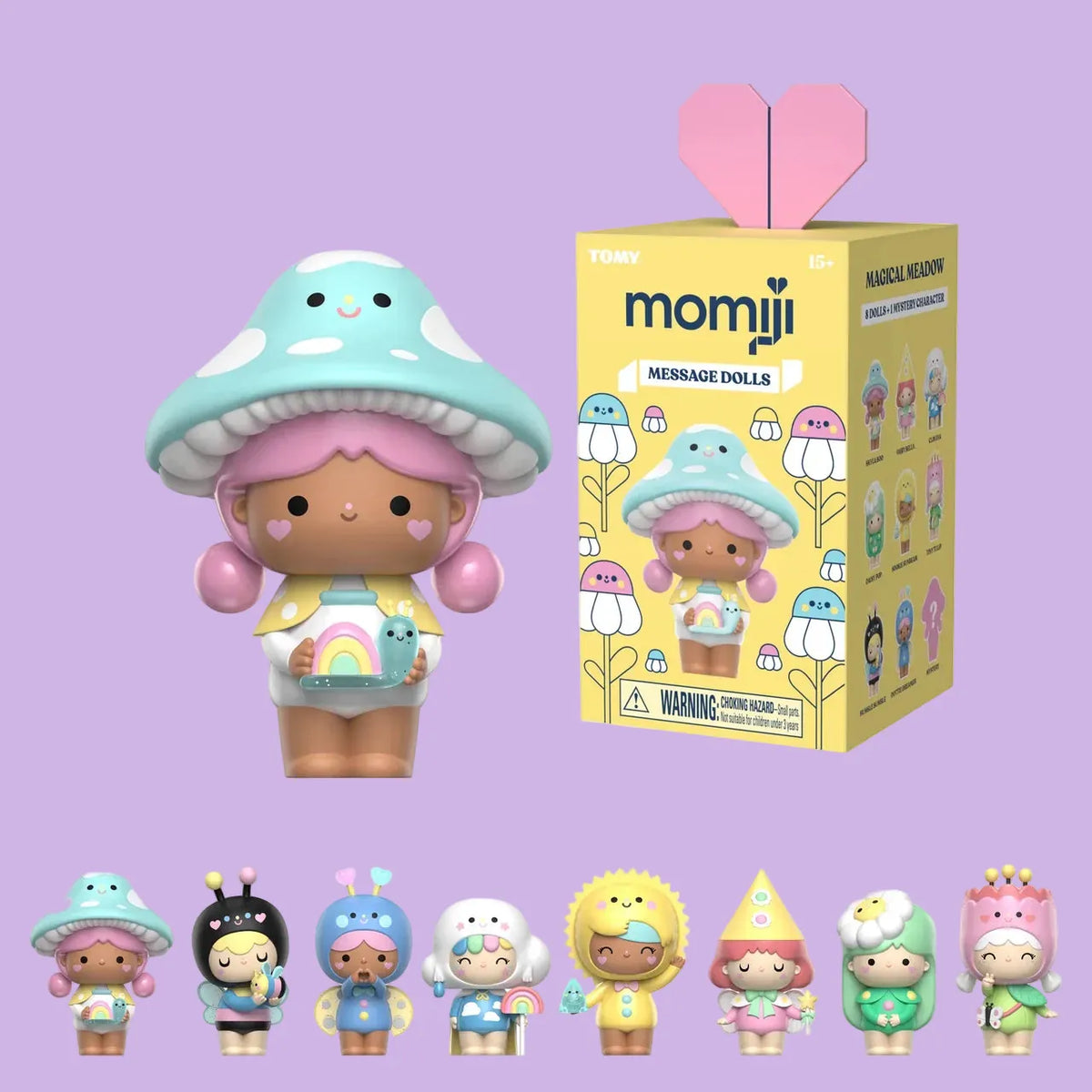 A cute Momiji message doll of a girl with a mushroom hat beside a yellow blind box of Momiji message dolls.