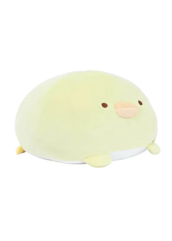 A round, yellow, chicken plush with a silly face.
