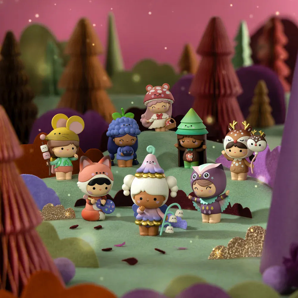 A collection of various cute figures wearing forest themed outfits. One has an owl costume, another has a mushroom hat, and a third is dressed like a fox.