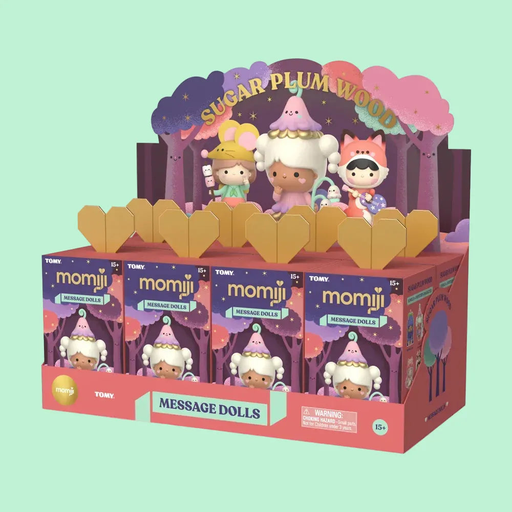 A collection of blind boxes containing cute figures dressed in forest themed outfits.