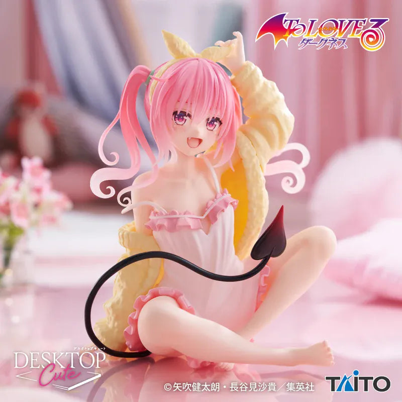 The pink haired character is sitting cross legged, sweater half off shoulder, and one hand on the her hair ribbon.