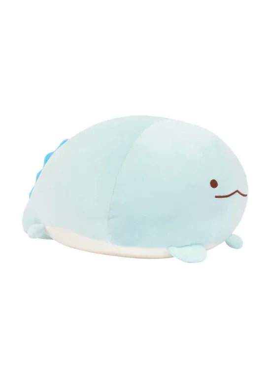 A round, blue, axolotl plush with a silly face.