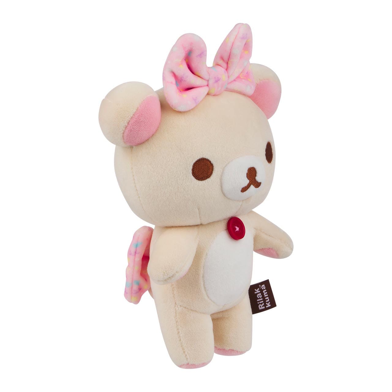 Three quarters view of a bear plushie, with a red button on its chest, and a pink bow on its head.