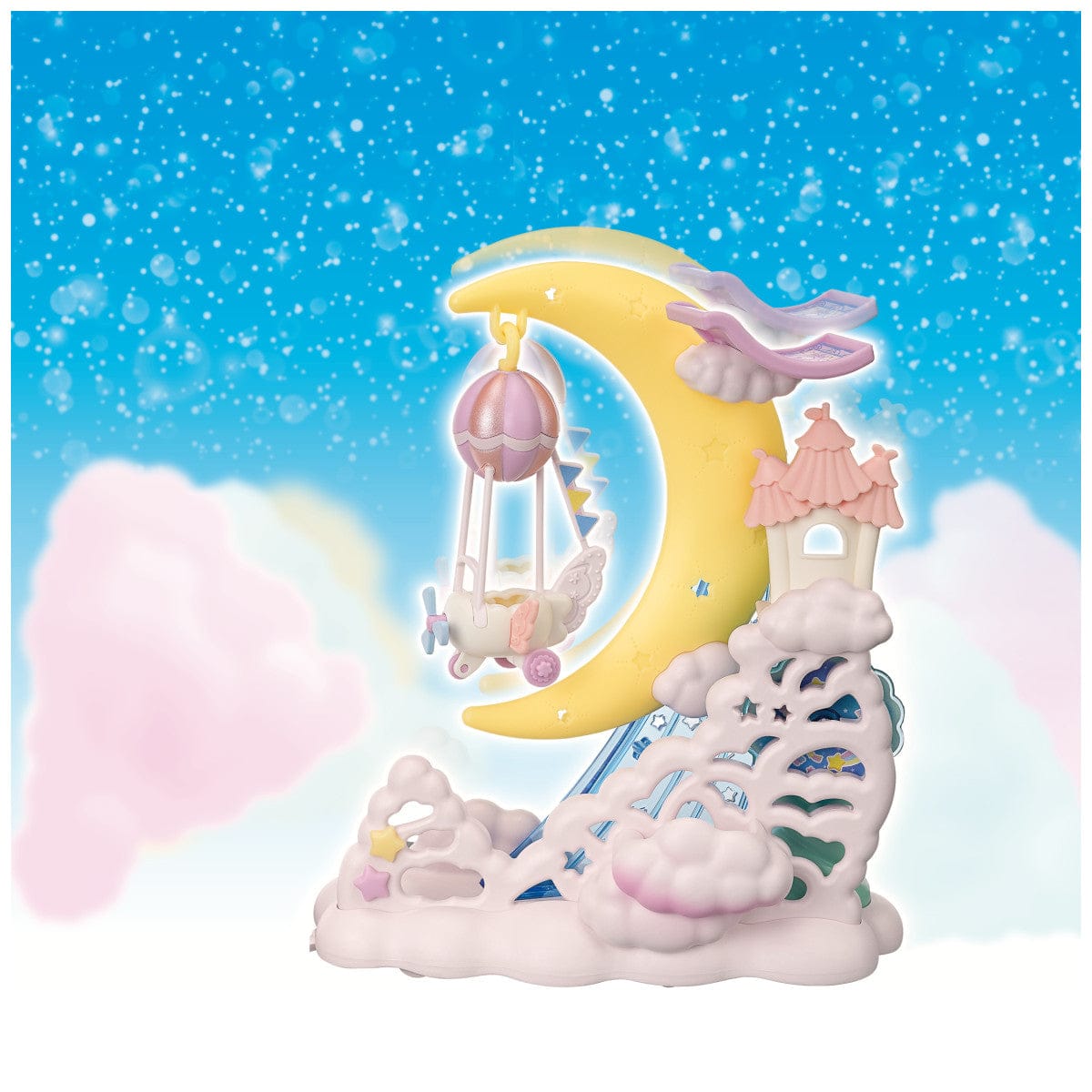 A parade float featuring a moon. A little plane dangles from the moon and a magic carpet is at the top. There are little clouds and a little castle. 