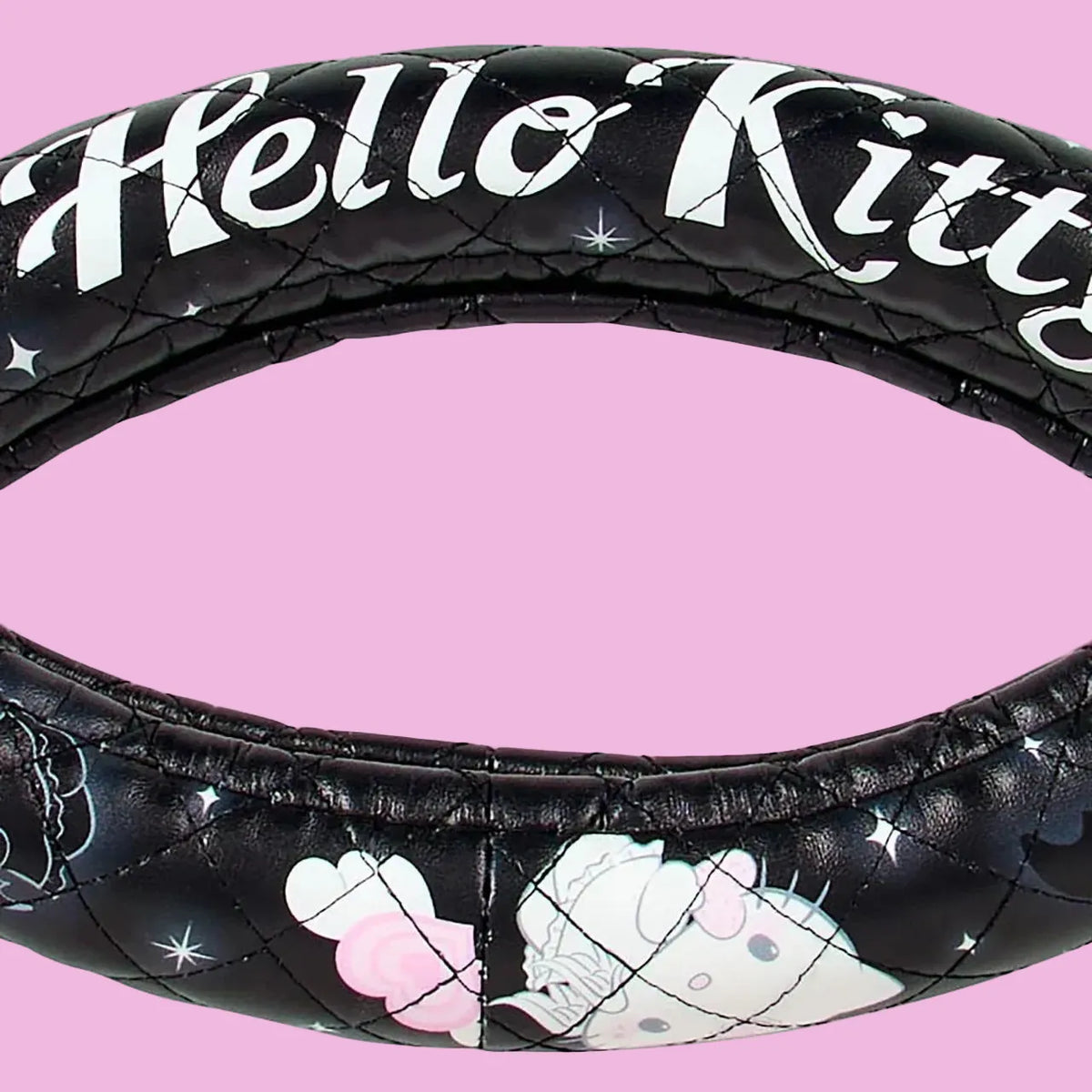 A black cover for a steering wheel with illustrations of Hello Kitty on it.