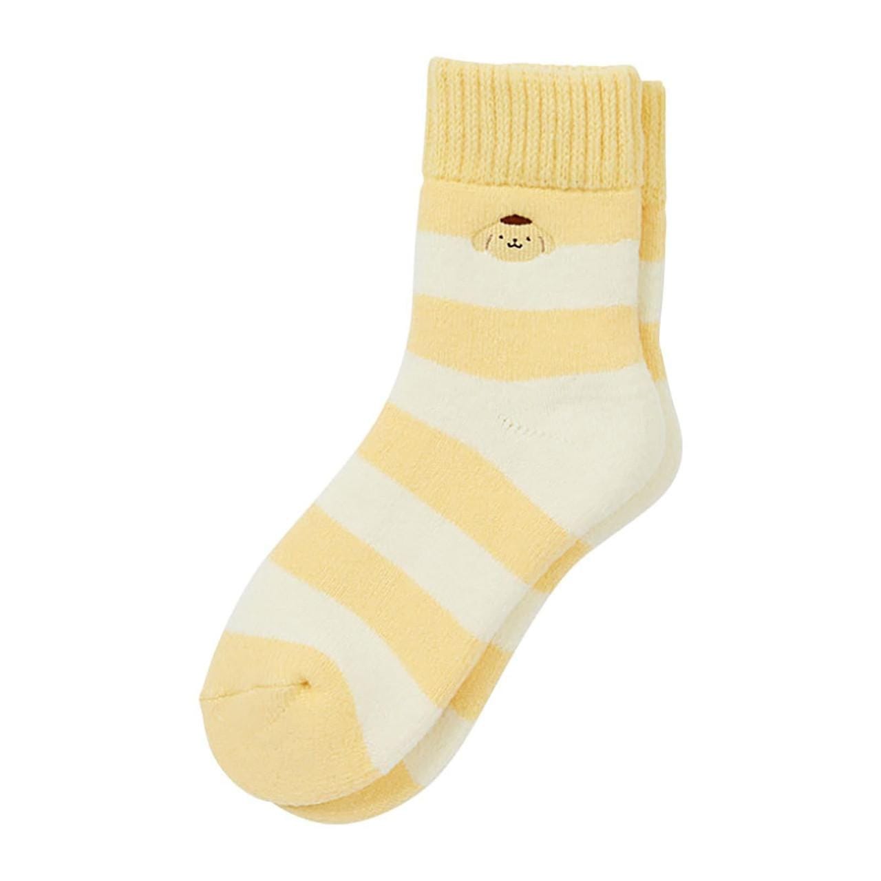 Yellow and white socks with a stitching of a cute little dog near the ankle.