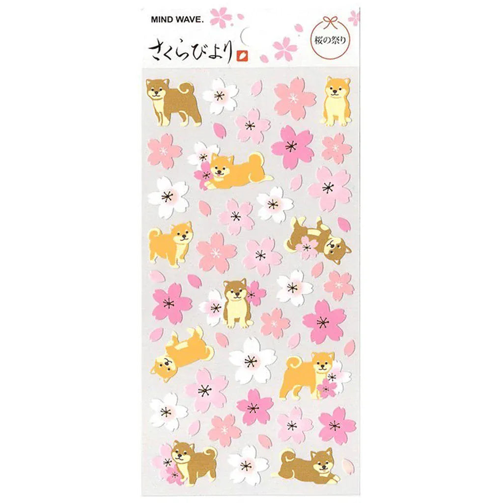 A sticker sheet with various stickers of cartoon dogs and pink flowers.