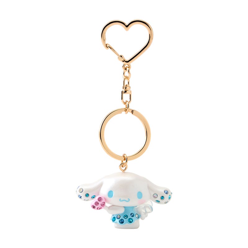 Gold hardware keychain with heart-shaped clasp featuring molded Cinnamoroll figure as an angel encrusted with rhinestones